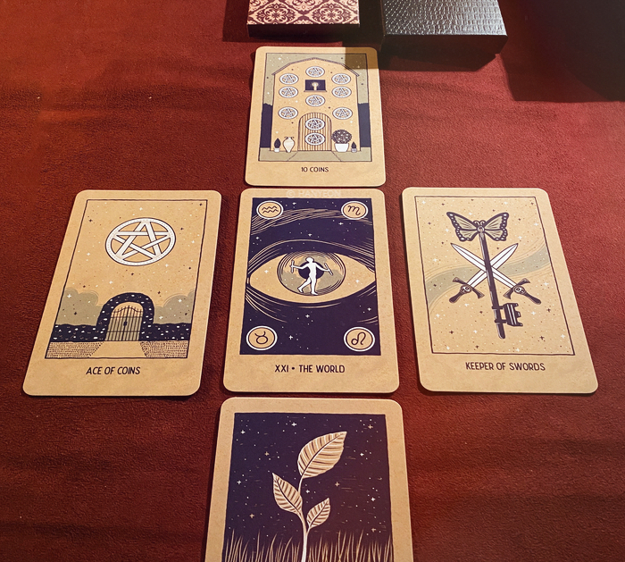 A spread of cards laid out on a table